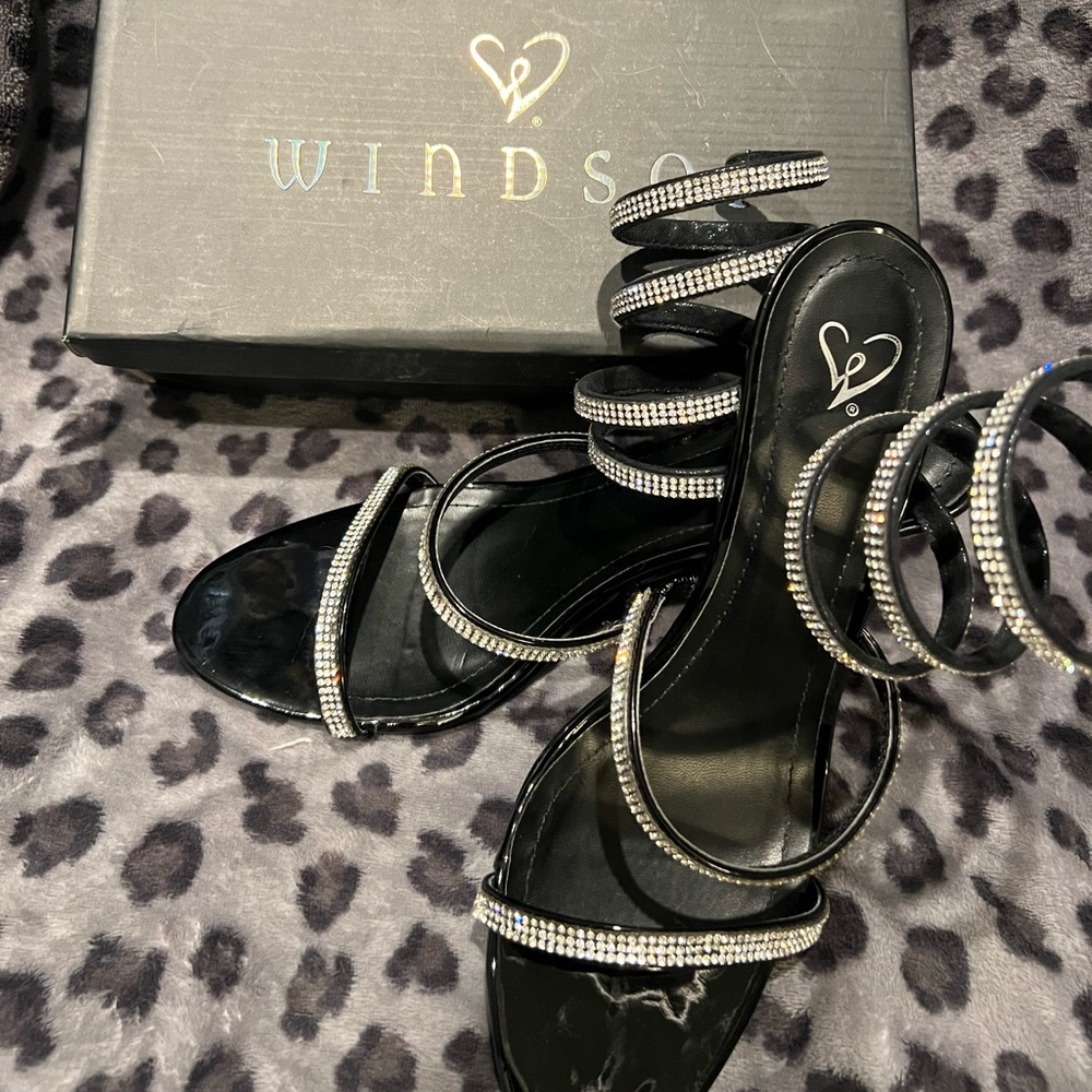 Beautiful rhinestone high heels. Like new. Worn once to a military ball. Size 9.